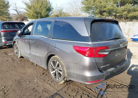 2022 Honda Odyssey Touring z USA, uszkodzony, nr VIN 5FNRL6H86NB067383
